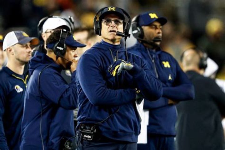 What just happened to Michigan coach?